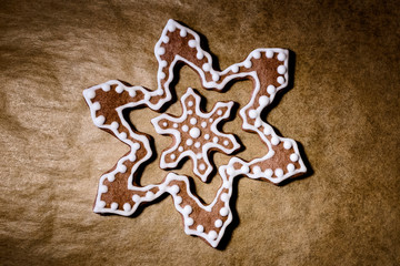Gingerbread christmas cookies on wooden table.