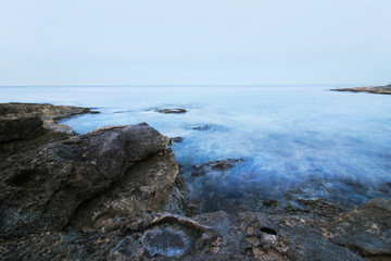 long exposure of peaceful ocean at coast