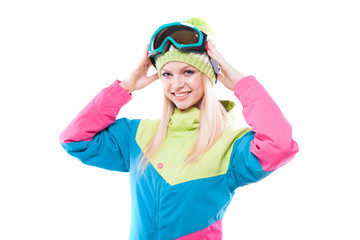 pretty young woman in ski outfit and ski glasses