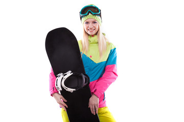 pretty young woman in ski outfit and ski glasses hold snowboard