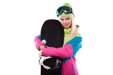 beautiful young woman in ski outfit and ski glasses hold snowboard