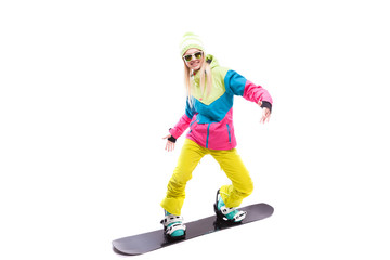 beauty young woman in ski suit and sunglasses ride snowboard
