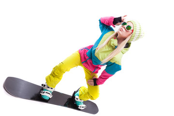 beauty young woman in ski suit and sunglasses ride snowboard