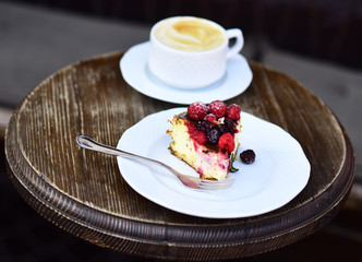 Delicious dessert on brown textured background. Patisserie concept.