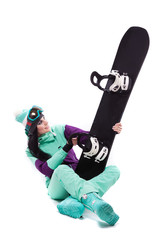 young pretty woman in purple ski costume and ski glasses hold black snowboard
