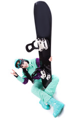 young pretty woman in purple ski costume and ski glasses hold black snowboard