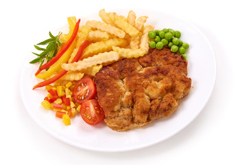 Wiener schnitzel with potatoes fries, isolated on white background