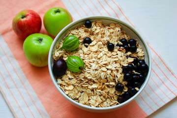 oatmeal with berries currants and gooseberries.Muesli