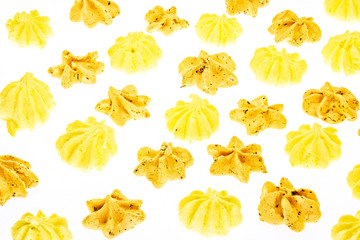 Colorful meringues on white. Many sweet zephyrs pattern