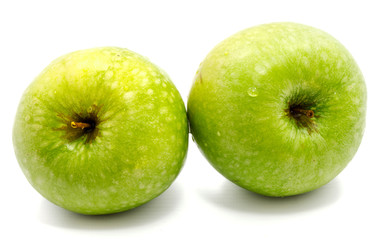 Two whole green apples Granny Smith isolated on white background