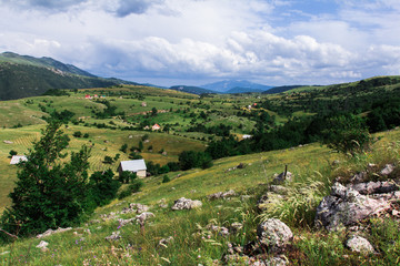 Fields, meadows, mountains, roads. Balkans. An aerial top-view