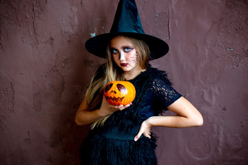 Girl in witch costume