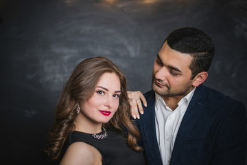 portrait of a pair of brunettes male and female