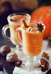 Pumpkin spice latte, hot coffee drink with pumpkin and cinnamon