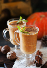 Pumpkin spice latte, hot coffee drink with pumpkin and cinnamon