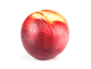 Fresh raw nectarine isolated on white