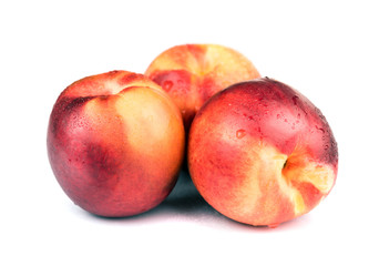 Fresh raw nectarine isolated on white