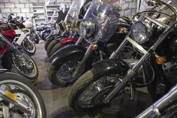 Fototapeta premium Winter laying-up of motorcycles in warehouse