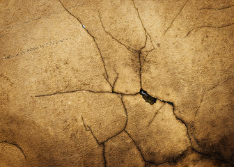 ocher old wall with cracks