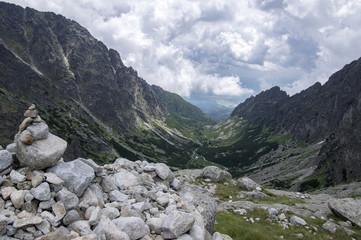 Fototapeta na wymiar Mala studena dolina hiking trail in High Tatras, summer touristic season, wild nature, touristic trail, stone cairn