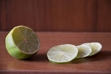 Fresh limes on a table cutting prepare for lime juice
