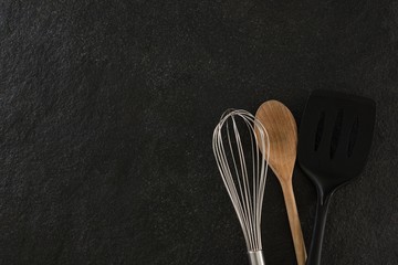 Whisker, wooden spoon and spatula - Powered by Adobe