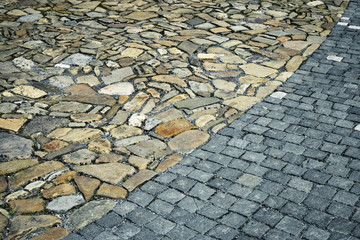 two kinds of stone paving next to each other
