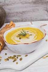 Pumpkin soup with cream and pumpkin seeds