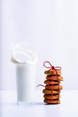 Oatmeal Christmas cookies with a glass of milk. Winter holiday