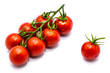 Group of whole red tomato cherry isolated on white background