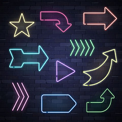 Set of neon frame star arrows pointers signs light electric banners glowing on black brick wall background, vector illustration