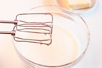 mixer for the dough on white table