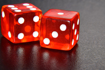 Red Casino Dice - Isolated Objects, Gambling in Reno Nevada, Throwing a Six and One, Close Up