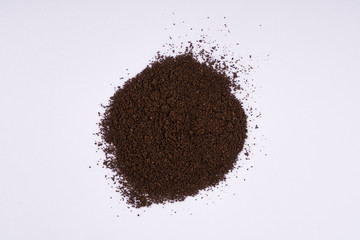 ground coffee on a white table	