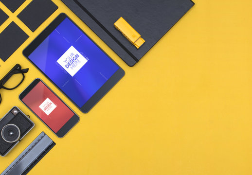 Mockup of Tablet and Smartphone on Yellow Background with Desk Accessories