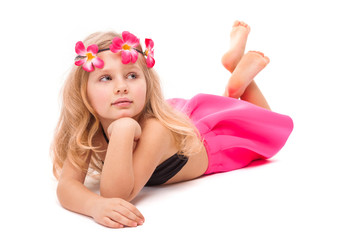 Obraz na płótnie Canvas Cute pretty little girl in black bikini, pink skirt and pink wreath