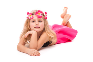 Obraz na płótnie Canvas Cute pretty little girl in black bikini, pink skirt and pink wreath