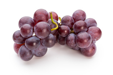 Ripe red grape isolated on white.