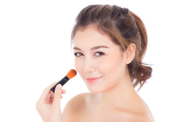 Beauty asian woman applying make up with brush of cheek isolated on white background, beautiful of girl holding blusher,  skincare and cosmetic concept.