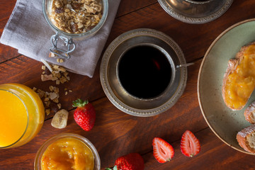 Traditional european breakfast. Coffee, jam and berries