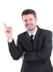 smiling businessman pointing copy space.