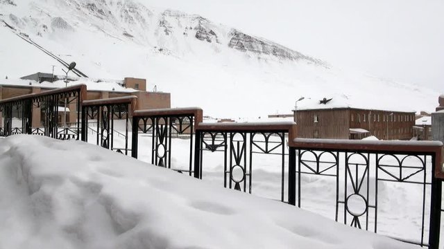 Abandoned city Pyramiden Spitsbergen Arctic. Russian neglected township. Canned place times of Soviet Union. Time stood still of North Pole.
