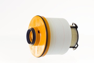 Fuel filter for a diesel engine on a gray background. Horizontal image