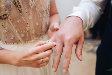 Bride and groom with wedding rings