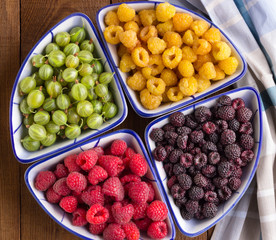 Mix Berries Wooden background Antioxidants Detox diet Organic fruits Flat lay