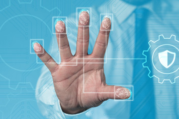 Biometric scanning of a hand, with fingerprints to secure your business: close up concept