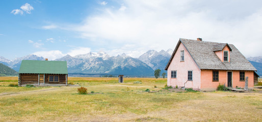 Mormon Row - Craggy Tetons form a wonderful backyard to these abandoned houses