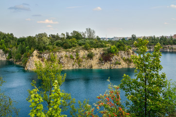 Obraz premium Beautiful quarry with blue water. Water reservoir Zakrzowek in Krakow, Poland.