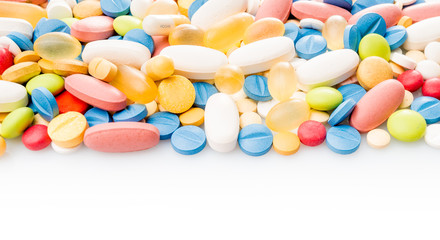 pills border. Multicoloured medical pills