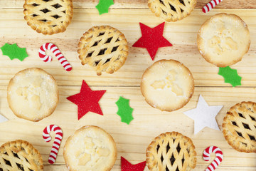 Selection of mince pies and christmas decorations